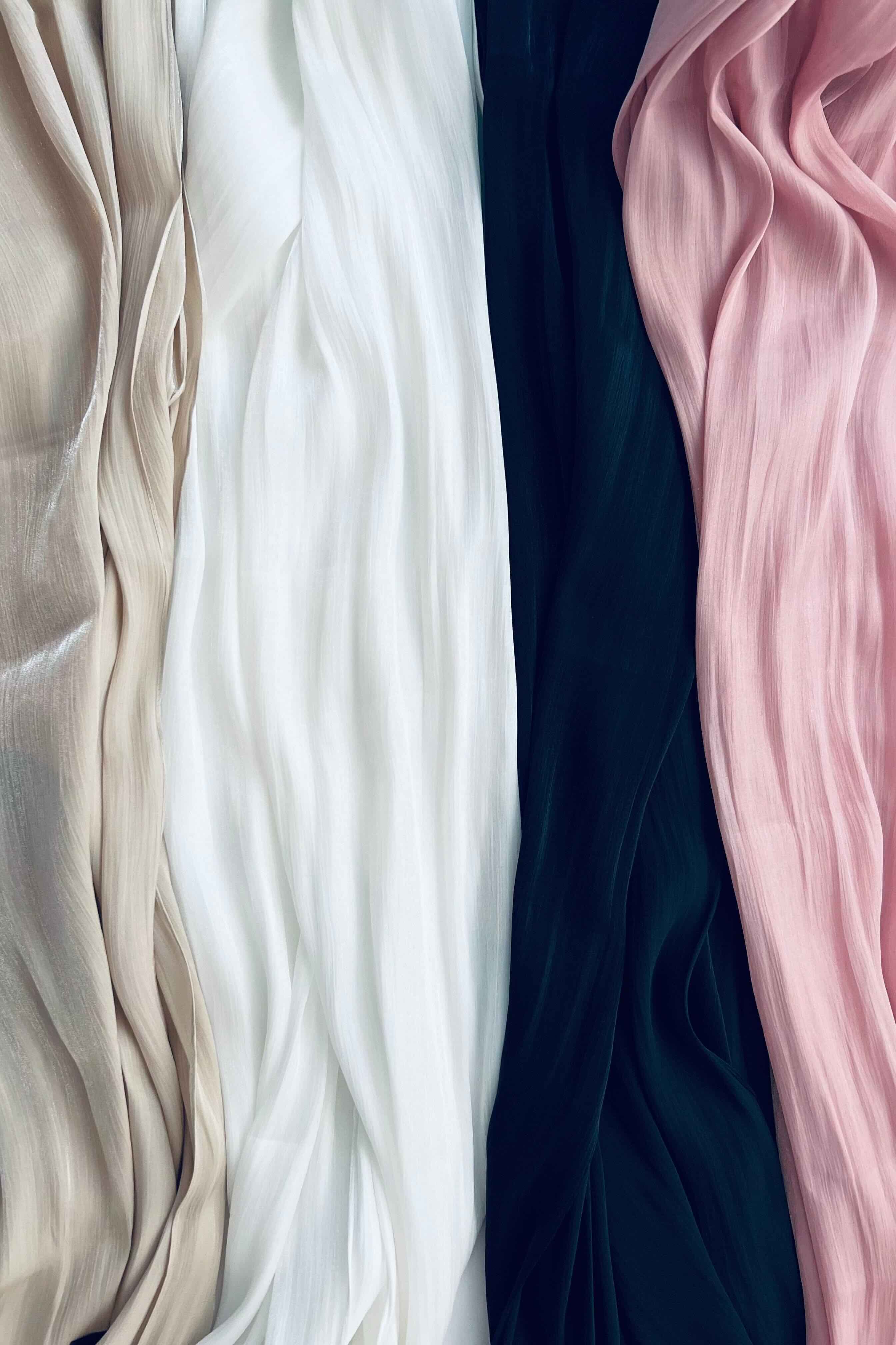 Organza silk hijab in beige, white, black, and pink.